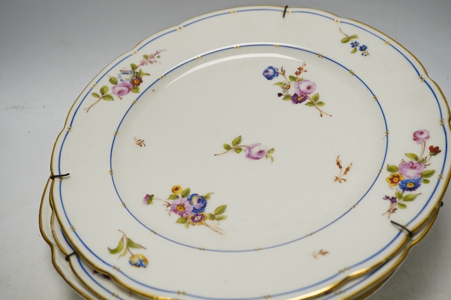 Three porcelain plates comprising an 18th century Meissen floral example and two Sevres, together with an 18th century polychrome tin glazed, largest 25cm in diameter. Condition - fair